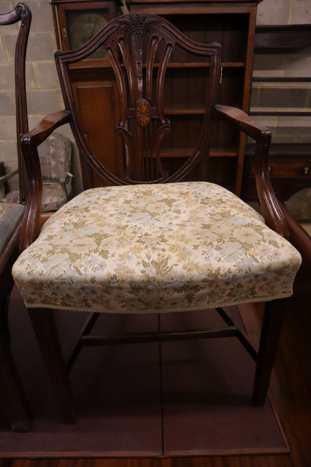 A George III mahogany dining chair together with an inlaid mahogany elbow chair